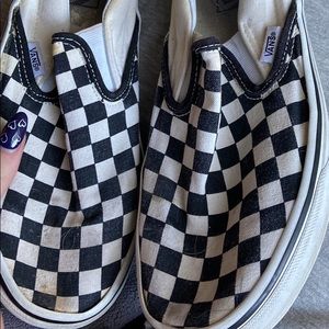 Black and white checkered converse low top